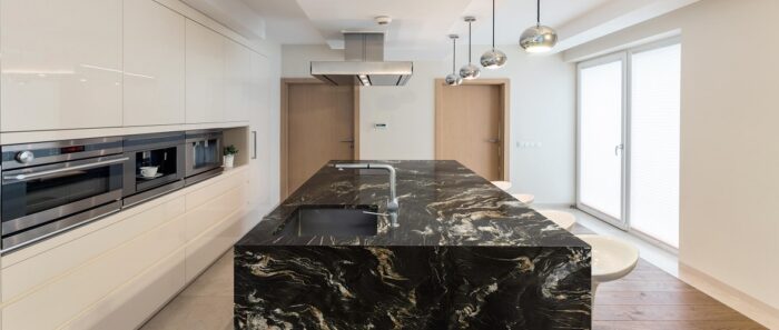 Tiles & Walls Modern kitchen island with Belvedere Quartzite countertop