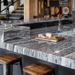 Modern kitchen with Cambria Roxwell Quartz worktops in a stylish London home.