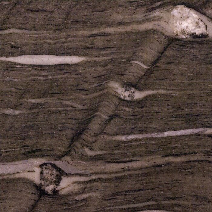 Brown Silk marble - Worktops Close-up of Brown Silk Marble showing unique natural patterns, ideal for interiors and exteriors in London, UK.