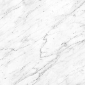 Close-up of Bianco Carrara Marble texture, showcasing its elegant veining, popular in UK homes.