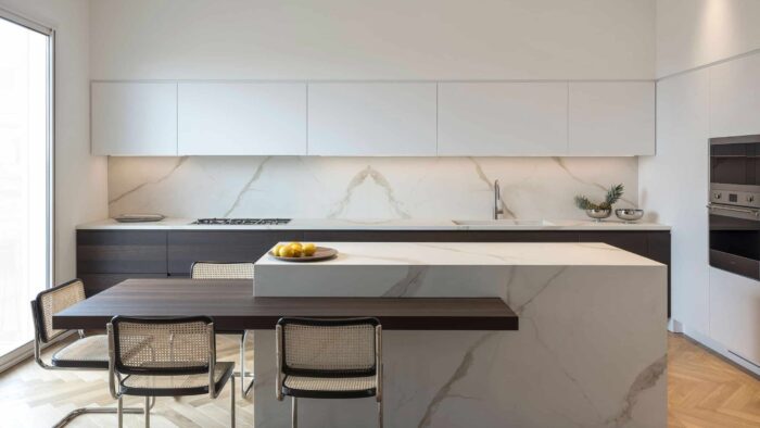 Flooring Modern kitchen in London featuring Laminam Calacatta Oro Venato worktop