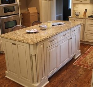 Kitchen island with Carioca Gold Granite worktop in a modern UK home